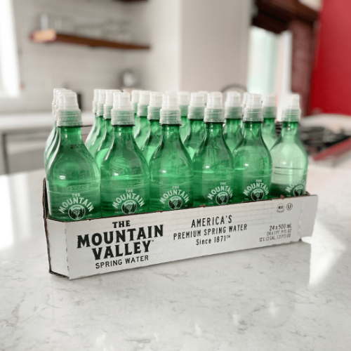 mountain valley spring water sports bottles on counter