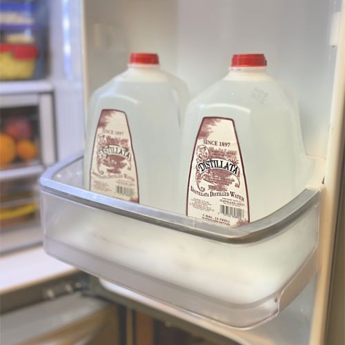 distilled water gallon bottles in fridge
