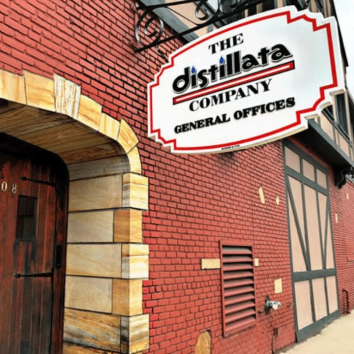 Distillata front door and office sign