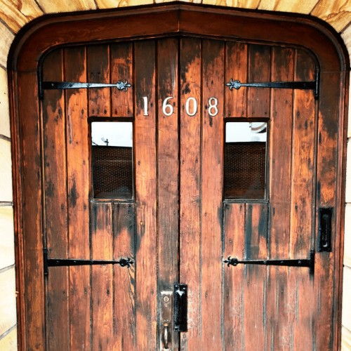 Distillata antique wood door at 1608 east 24th st, cleveland