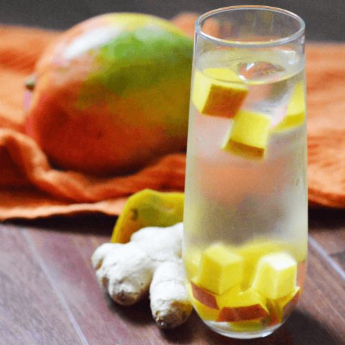 mango ginger infused water in clear glass