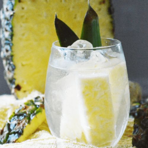 pineapple flavored infused water in clear glass