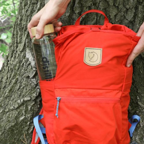 hiking with backpack and reusable distillata water bottle