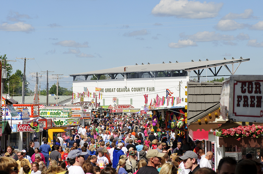 Crowds throng the midway at the 188th annual Great Geauga County Fair the state's oldest continuously running fair in Burton Ohio on September 5 2010