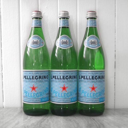 three bottles of san pellegrino sparkling water