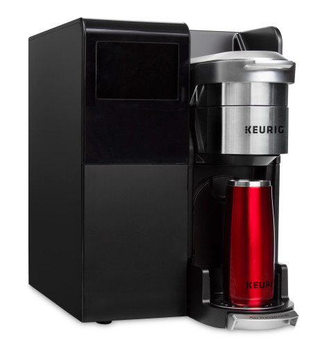commercial keurig coffee brewer angle with travel mug