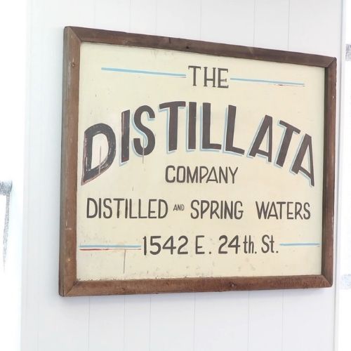 the Distillata company vintage sign