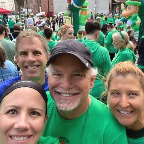 family waiting at starting line for the St. Patricks Day parade in Cleveland, Oh