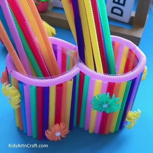 rainbow pencil holder made from a water bottle