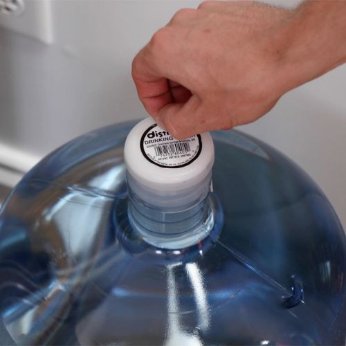 removing sticker from 5 gallon water bottle