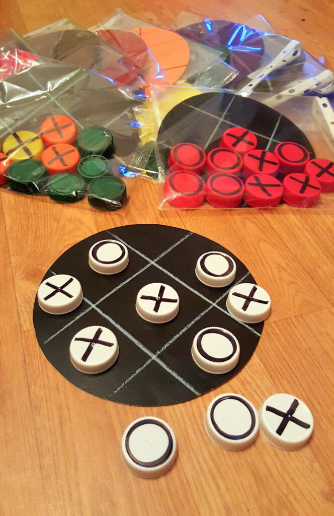 tic tac toe board game made with bottle caps